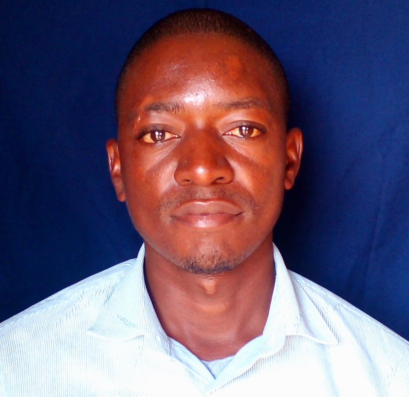 Mr. GEOFREY REINFORD MWAKYUSA